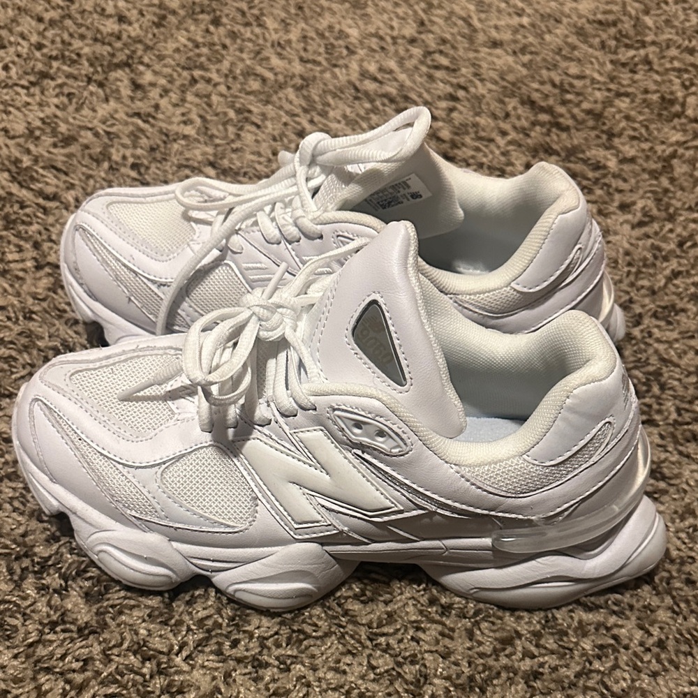 New balance 9060 women’s size 7 triple white with a stain